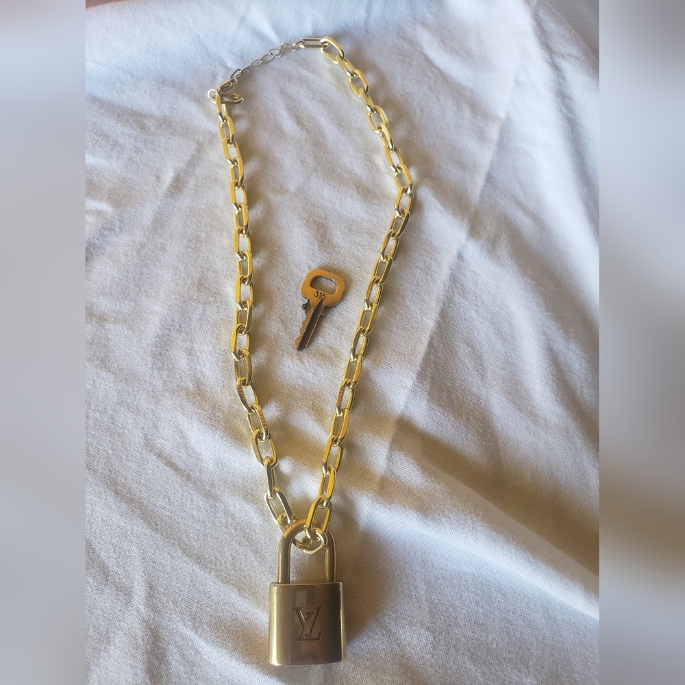 Louis Vuitton 315 authentic lock necklace